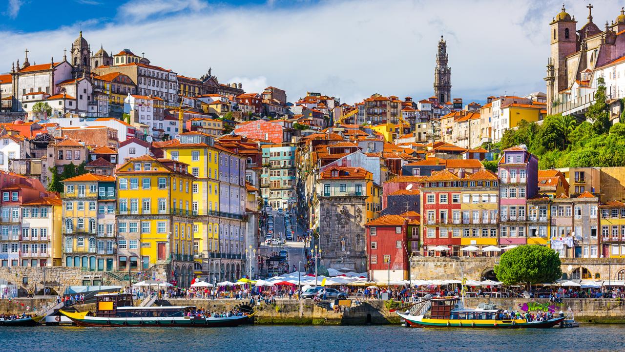 Porto, Portugal old town skyline from across the Douro River.